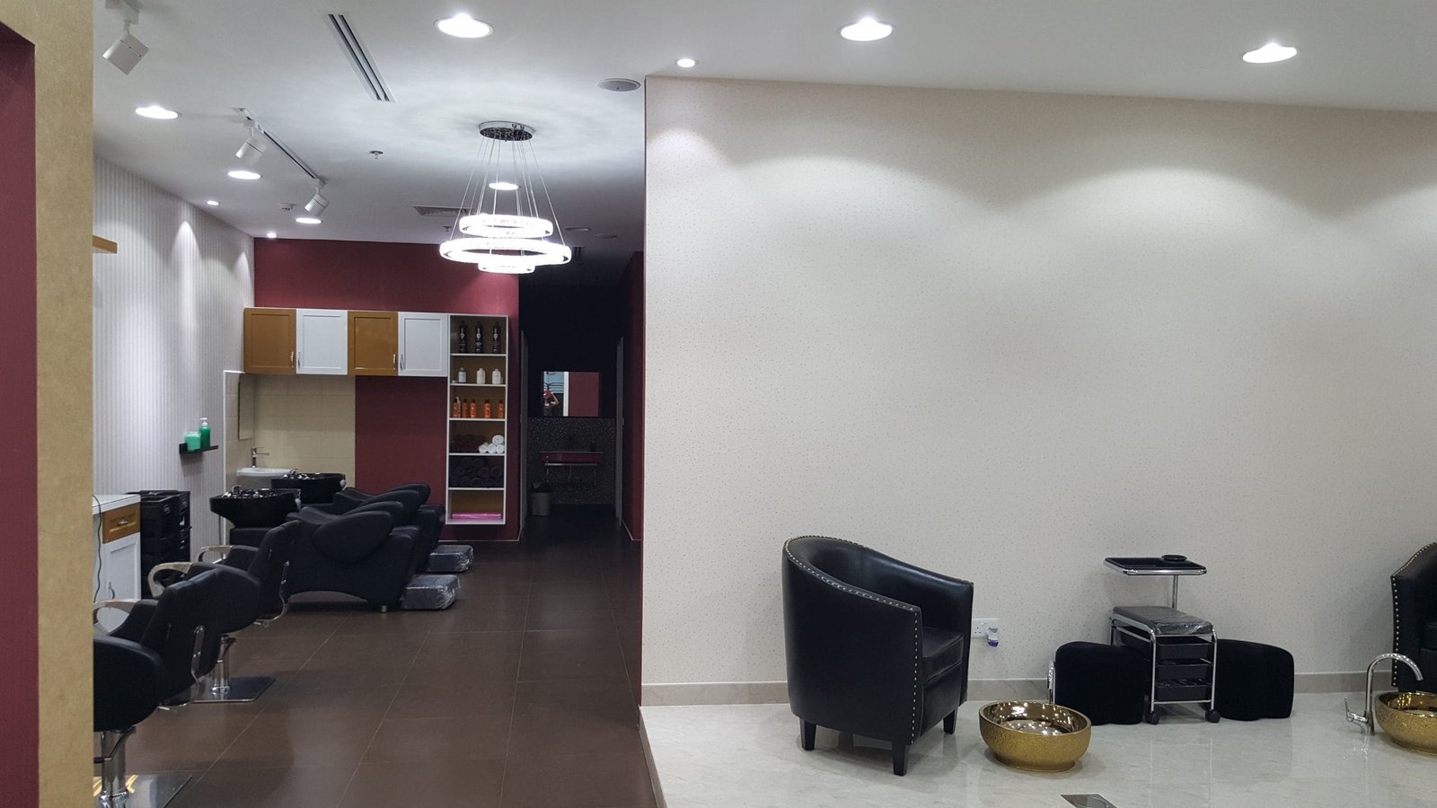 Glam look beauty salon Interiors displaying beauty products and tools Glam look beauty salon Interiors displaying beauty products and tools